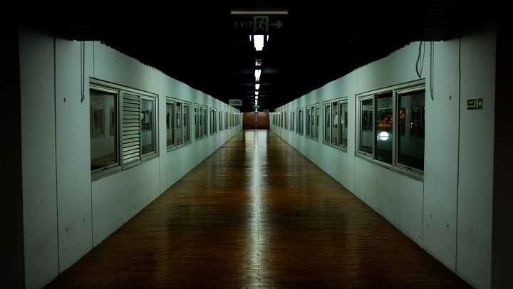 A long empty spooky hospital corridor