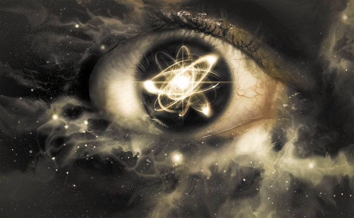 A fantasy illustration of an atom inside an eyeball against a starry backdrop